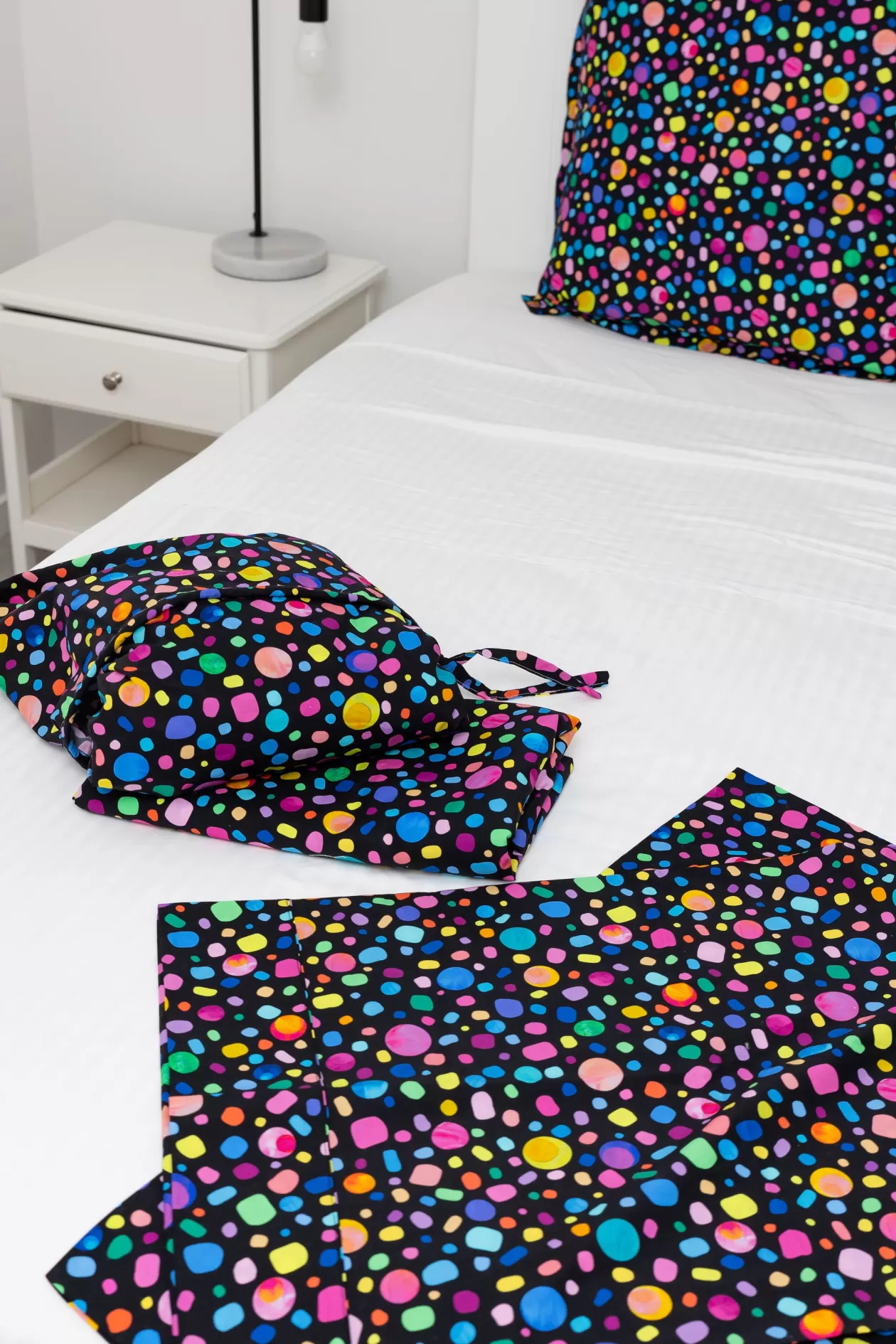 Proud Poppy Clothing Sleep Bright Black Pebble Sheet Set by Kasey Rainbow